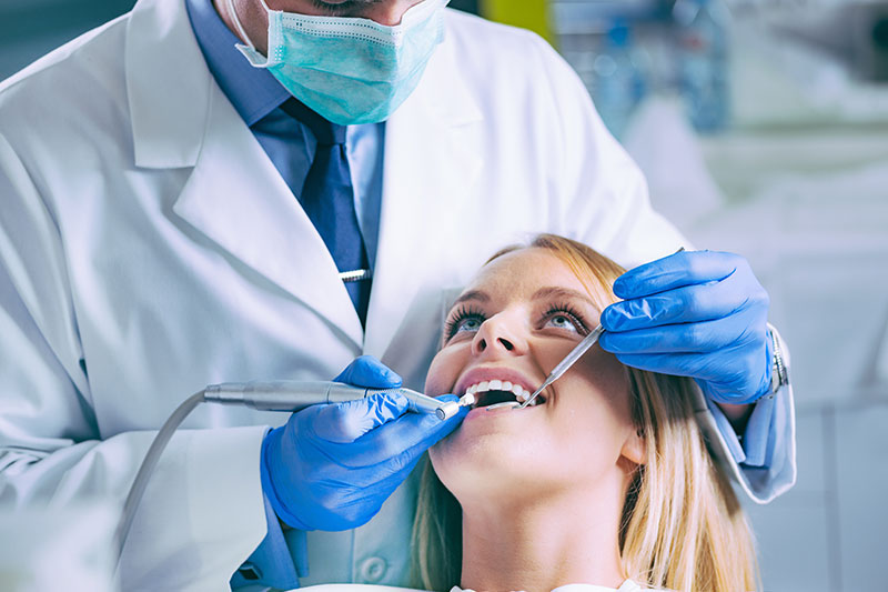dentist-drilling-teeth-DX2JTHU