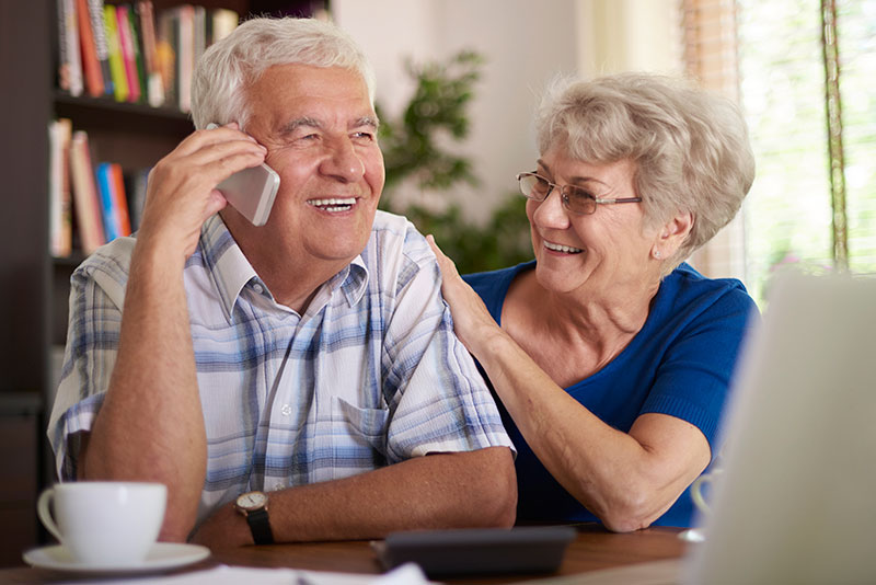 old-man-talking-on-the-phone-QMXPKAV